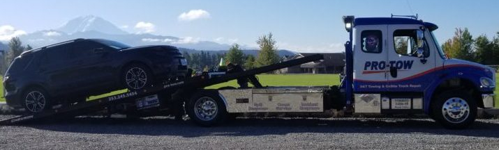 When Do You Need a Flat Bed Towing Service?