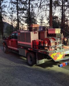 Lifting firetruck for emergency roadside assistance.