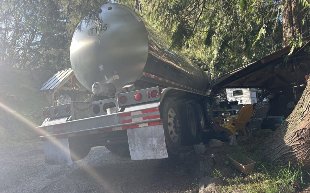 Dairy tanker stuck on rocks